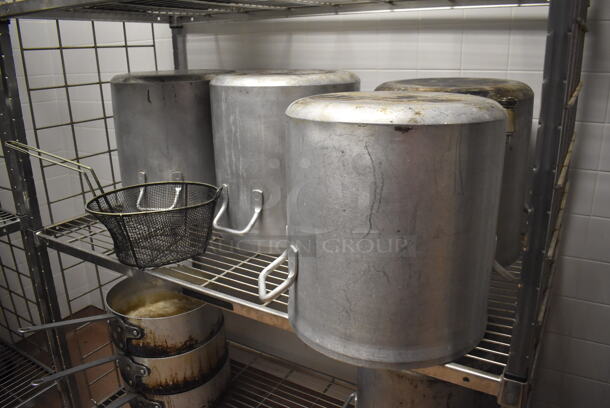 Metal 4 Tier Wire Shelving Unit on Commercial Casters w/ Contents Including Metal Stock Pots and Sauce Pans. BUYER MUST DISMANTLE. PCI CANNOT DISMANTLE FOR SHIPPING. PLEASE CONSIDER FREIGHT CHARGES. 48x24x78. (Dishroom) - Image 3 of 4