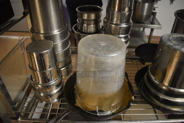 Metal 4 Tier Wire Shelving Unit on Commercial Casters w/ Contents Including Metal Lids, Baking Pans and Cylindrical Drop In Bins. BUYER MUST DISMANTLE. PCI CANNOT DISMANTLE FOR SHIPPING. PLEASE CONSIDER FREIGHT CHARGES. 48x24x78. (Dishroom) - Image 5 of 7