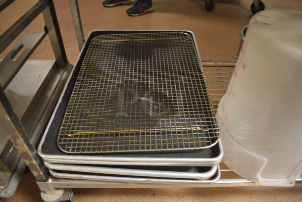 Metal 4 Tier Wire Shelving Unit on Commercial Casters w/ Contents Including Metal Lids, Baking Pans and Cylindrical Drop In Bins. BUYER MUST DISMANTLE. PCI CANNOT DISMANTLE FOR SHIPPING. PLEASE CONSIDER FREIGHT CHARGES. 48x24x78. (Dishroom) - Image 6 of 7