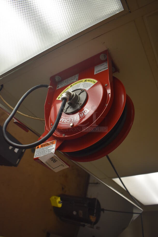 Reelcraft LK 4545 123 7A Metal Ceiling Mounted Extension Cord on Reel. BUYER MUST REMOVE. 13x9x20. (Education Kitchen) - Image 1 of 3