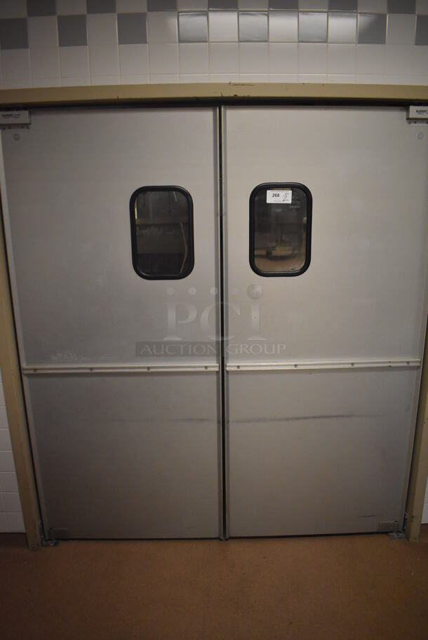 2 Eliason Metal Commercial Swinging Kitchen Doors. BUYER MUST REMOVE. 35x1.5x78. 2 Times Your Bid! (Dishroom)