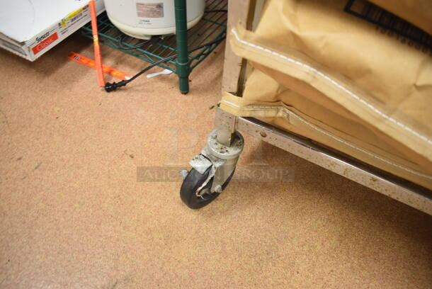 Metal 4 Tier Wire Shelving Unit on Commercial Casters. Does Not Include Contents. BUYER MUST DISMANTLE. PCI CANNOT DISMANTLE FOR SHIPPING. PLEASE CONSIDER FREIGHT CHARGES. 48x24x70. (Restaurant Kitchen) - Image 5 of 5