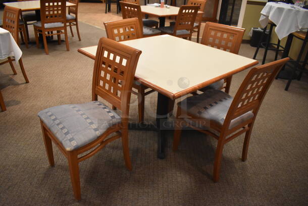 Square Dining Height Table on Black Metal Table Base w/ 4 Wood Pattern Dining Chairs w/ Blue Patterned Seat Cushion. Stock Picture - Cosmetic Condition May Vary. 42x42x29, 19x17x36. (Dining Room) - Image 2 of 6