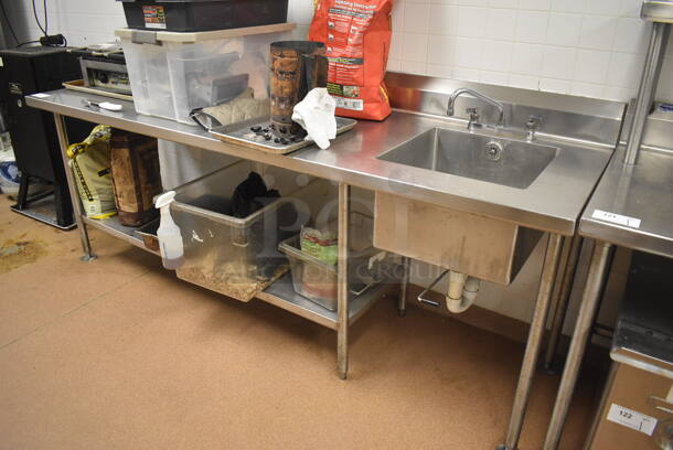 Stainless Steel Table w/ Sink Bay, Back Splash, Faucet, Handles and Under Shelf. BUYER MUST REMOVE. 96x30x42. Bay 18x18x12. (Restaurant Kitchen)