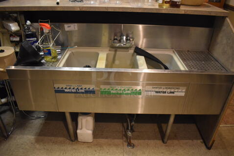 Glastender TSA-60 Stainless Steel Commercial 3 Bay Sink w/ Dual Drain Boards, Faucet and Handles. BUYER MUST REMOVE. 60x19x36. (Dining Room)