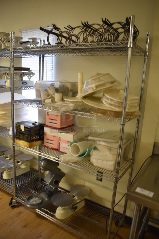 Chrome Finish 4 Tier Shelving Unit on Commercial Casters w/ Contents Including Wire Racks, Cake Stand Pieces, Mixer and Bakery Scale. BUYER MUST DISMANTLE. PCI CANNOT DISMANTLE FOR SHIPPING. PLEASE CONSIDER FREIGHT CHARGES. 48x18x76. (Computer Demo Lab 2)  - Image 1 of 7