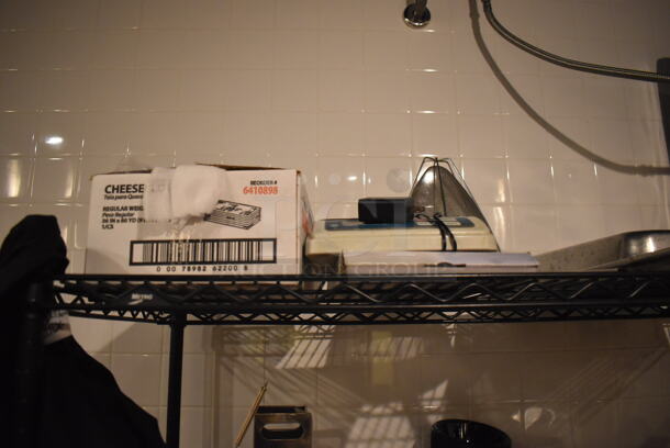 Black Finish Wire Shelving Unit on Commercial Casters w/ Contents Including Ingredient Bins, Metal Bowls and Cutting Boards. BUYER MUST DISMANTLE. PCI CANNOT DISMANTLE FOR SHIPPING. PLEASE CONSIDER FREIGHT CHARGES. 48x24x79. (Demo Kitchen) - Image 7 of 8