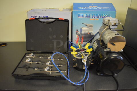 ALL ONE MONEY! Lot of Color Sprayer, Case of Extra Heads and Mini Air Compressor. Tested and Working! (Computer Demo Lab 2)