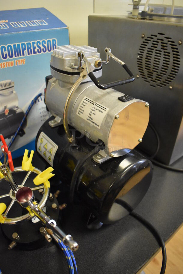 ALL ONE MONEY! Lot of Color Sprayer, Case of Extra Heads and Mini Air Compressor. Tested and Working! (Computer Demo Lab 2) - Image 2 of 7
