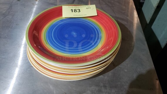 Lot of 7 Colorful Dinner Plates. 10.5" plates. 1 plate has a small chip.