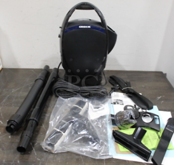 BRAND NEW! Oreck CC1600 Ultimate Handheld Bagged Canister Vacuum. Stock Picture Used For Gallery Picture. 120 Volts, 1 Phase. 14x10x16. Tested and Working! - Image 1 of 6