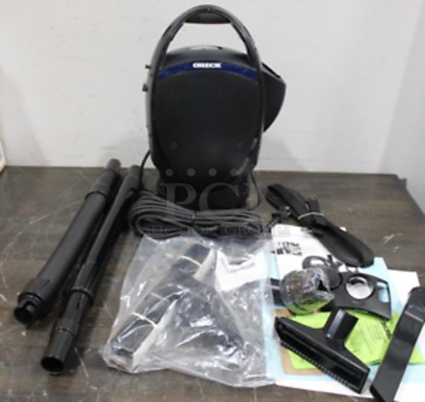 BRAND NEW! Oreck CC1600 Ultimate Handheld Bagged Canister Vacuum. Stock Picture Used For Gallery Picture. 120 Volts, 1 Phase. 14x10x16. Tested and Working!