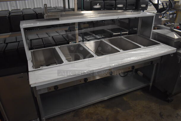 BRAND NEW SCRATCH AND DENT! 2022 KoolMore KM-OWS-5SG Stainless Steel Commercial Floor Style Electric Powered 5 Bay Steam Table w/ Cutting Board, Over Shelf and Sneeze Guard. 240 Volts. 72x31x50