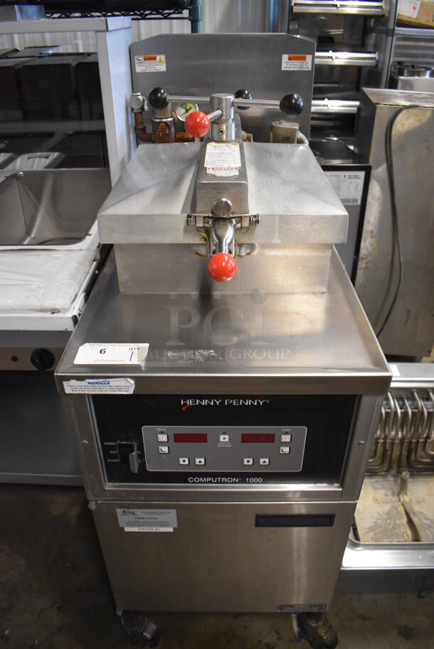2018 Henny Penny 600 Stainless Steel Commercial Floor Style Natural Gas Powered Pressure Fryer on Commercial Casters. 80,000 BTU. 18x39x48