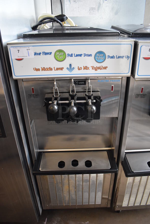 2011 Electro Freeze SL500-132 Stainless Steel Commercial Floor Style Water Cooled 2 Flavor w/ Twist Soft Serve Ice Cream Machine on Commercial Casters. 208-230 Volts, 3 Phase. 22x32x60 - Image 1 of 9
