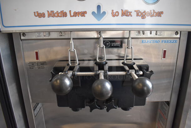2011 Electro Freeze SL500-132 Stainless Steel Commercial Floor Style Water Cooled 2 Flavor w/ Twist Soft Serve Ice Cream Machine on Commercial Casters. 208-230 Volts, 3 Phase. 22x32x60 - Image 2 of 9