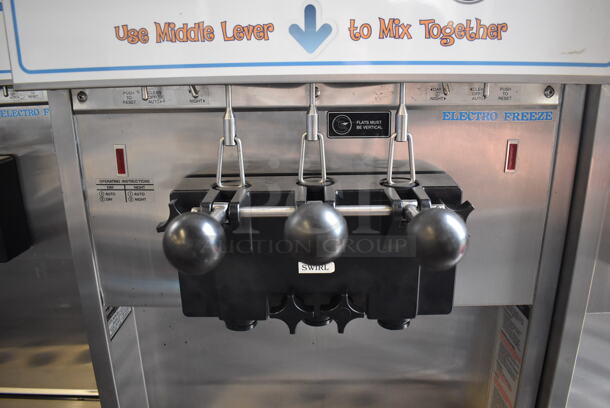 2011 Electro Freeze SL500-132 Stainless Steel Commercial Floor Style Water Cooled 2 Flavor w/ Twist Soft Serve Ice Cream Machine on Commercial Casters. 208-230 Volts, 3 Phase. 22x32x60 - Image 3 of 8