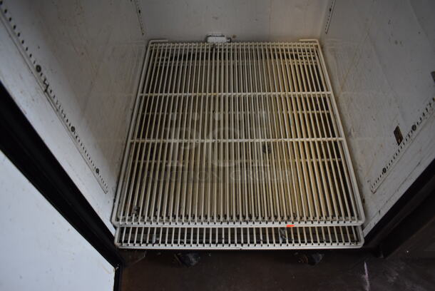 2010 True TG1R-1S Stainless Steel Commercial Single Door Reach In Cooler w/ Poly Coated Racks on Commercial Casters. 115 Volts, 1 Phase. 29x35x83. Tested and Working! - Image 7 of 7
