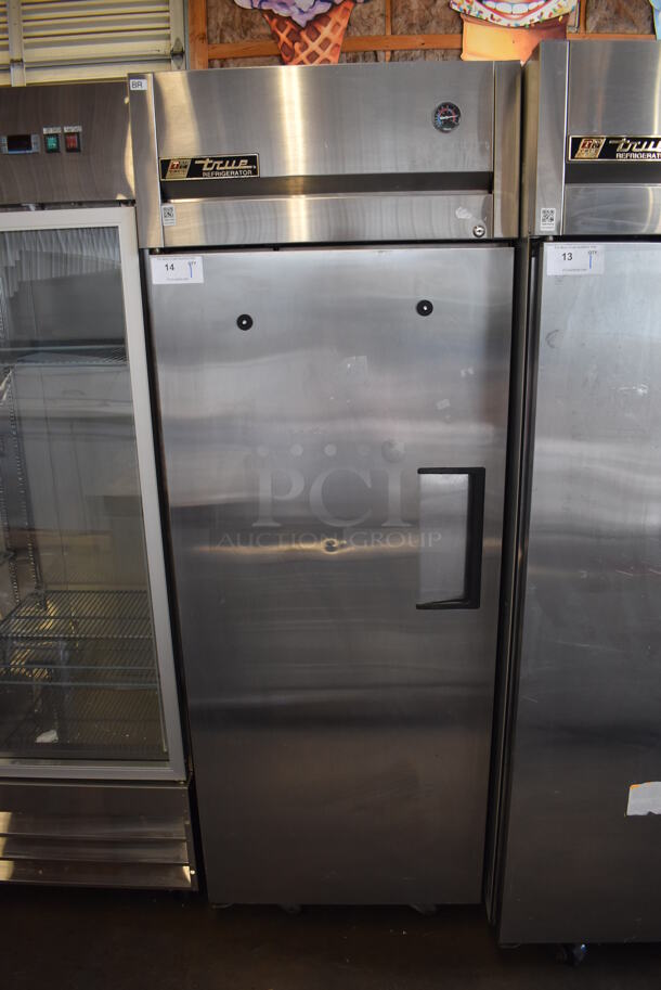2010 True TG1R-1S Stainless Steel Commercial Single Door Reach In Cooler w/ Poly Coated Racks on Commercial Casters. 115 Volts, 1 Phase. 29x35x83. Tested and Working!