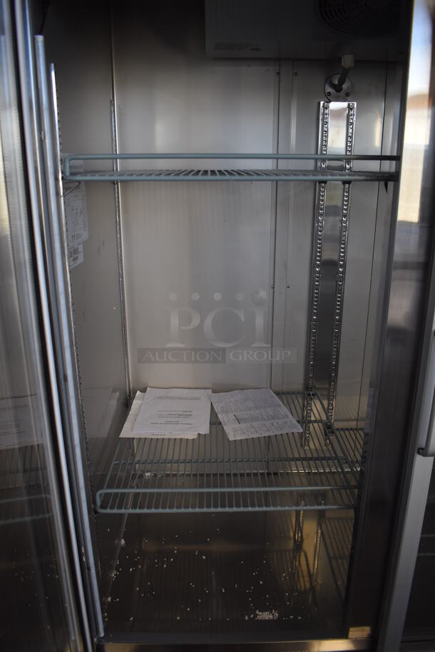 SCRATCH AND DENT! KoolMore RIR-2D-GD Stainless Steel Commercial 2 Door Reach In Cooler Merchandiser w/ Poly Coated Racks on Commercial Casters. 115 Volts, 1 Phase. 54x34x82. Tested and Powers On But Does Not Get Cold - Image 6 of 8