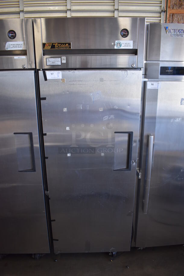 2011 True TG1R-1S Stainless Steel Commercial Single Door Reach In Cooler w/ Poly Coated Racks on Commercial Casters. 115 Volts, 1 Phase. 29x35x83. Tested and Working! - Image 1 of 7