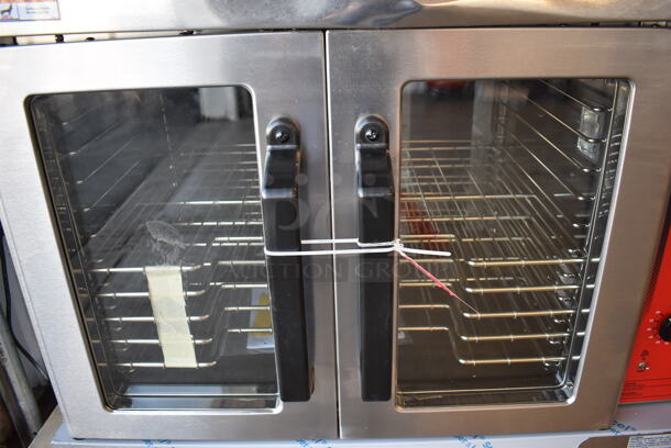 BRAND NEW SCRATCH AND DENT! LATE MODEL! Vulcan VC4GD-11D150K ENERGY STAR Stainless Steel Commercial Natural Gas Powered Powered Full Size Convection Oven w/ View Through Doors, Metal Oven Racks and Thermostatic Controls. 40x31x31. Tested and Working! - Image 9 of 11
