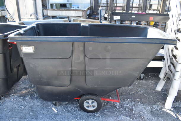 BRAND NEW SCRATCH AND DENT! Rubbermaid Black Poly Portable Bin on Casters. 69x34x44 - Image 1 of 4