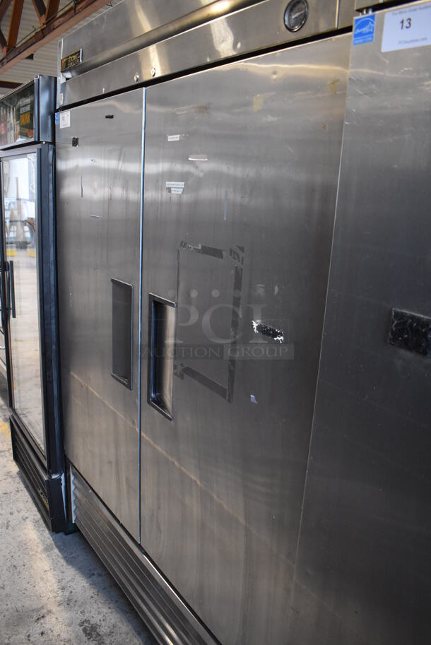 2013 True T-49F ENERGY STAR Stainless Steel Commercial 2 Door Reach In Freezer w/ Poly Coated Racks on Commercial Casters. 115 Volts, 1 Phase. 54x30x83. Tested and Working! - Image 1 of 6