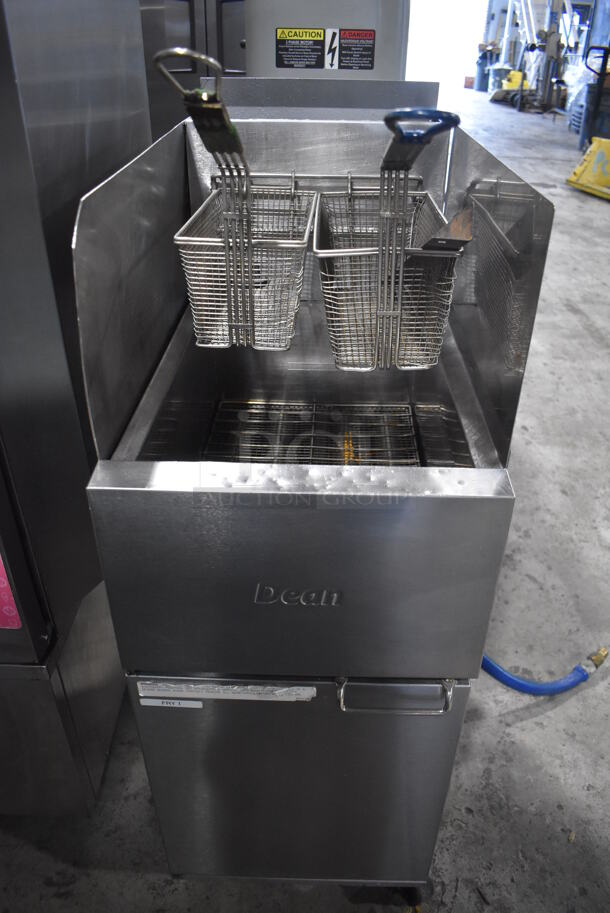 2013 Dean SR152GN Stainless Steel Commercial Floor Style Natural Gas Powered Deep Fat Fryer w/ 2 Metal Fry Baskets and Side Splash Guards on Commercial Casters. 120,000 BTU. 15.5x30x47 - Image 1 of 7