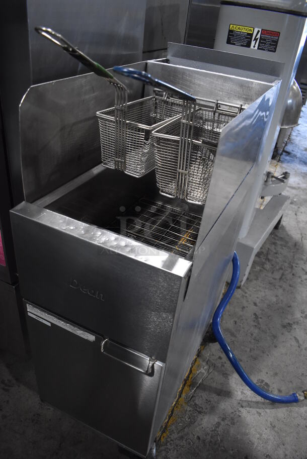 2013 Dean SR152GN Stainless Steel Commercial Floor Style Natural Gas Powered Deep Fat Fryer w/ 2 Metal Fry Baskets and Side Splash Guards on Commercial Casters. 120,000 BTU. 15.5x30x47 - Image 2 of 7