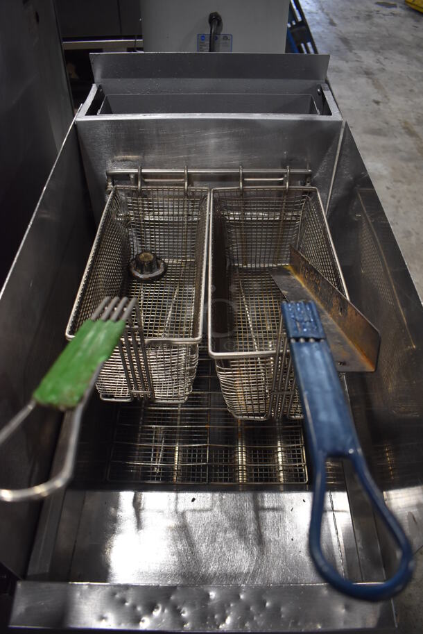 2013 Dean SR152GN Stainless Steel Commercial Floor Style Natural Gas Powered Deep Fat Fryer w/ 2 Metal Fry Baskets and Side Splash Guards on Commercial Casters. 120,000 BTU. 15.5x30x47 - Image 4 of 7