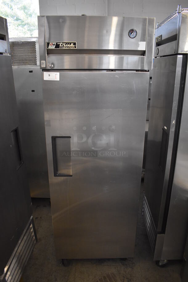 True TG1F-1S Stainless Steel Commercial Single Door Reach In Freezer w/ Poly Coated Racks on Commercial Casters. 115 Volts, 1 Phase. 28x35x83. Tested and Working!