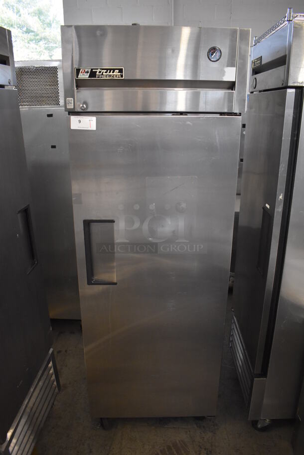 True TG1F-1S Stainless Steel Commercial Single Door Reach In Freezer w/ Poly Coated Racks on Commercial Casters. 115 Volts, 1 Phase. 28x35x83. Tested and Working! - Image 1 of 7