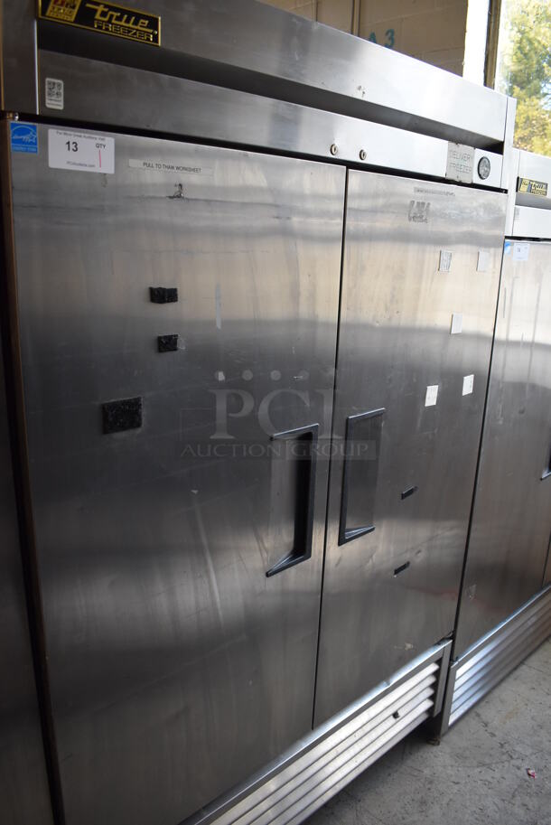 2013 True T-49F ENERGY STAR Stainless Steel Commercial 2 Door Reach In Freezer w/ Poly Coated Racks on Commercial Casters. 115 Volts, 1 Phase. 54x30x83. Tested and Working!