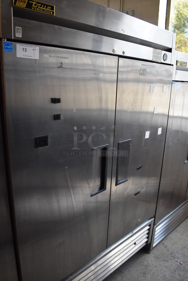 2013 True T-49F ENERGY STAR Stainless Steel Commercial 2 Door Reach In Freezer w/ Poly Coated Racks on Commercial Casters. 115 Volts, 1 Phase. 54x30x83. Tested and Working! - Image 1 of 6