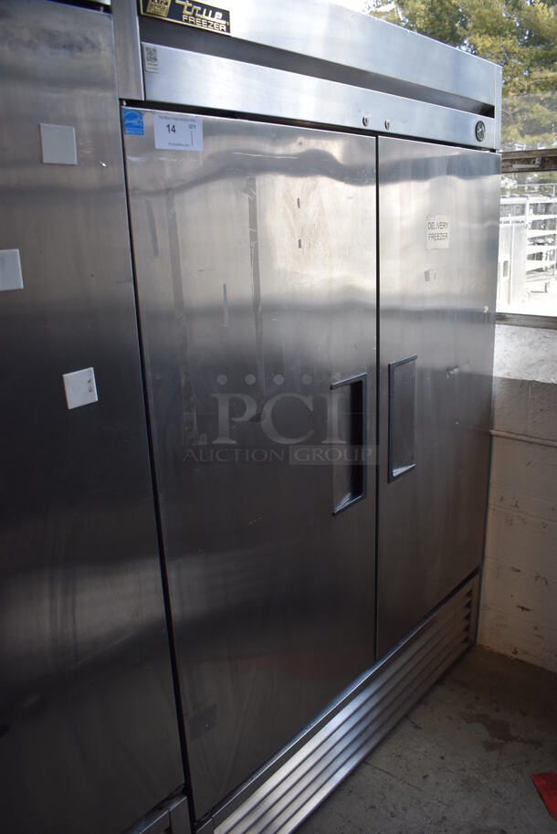 2013 True T-49F ENERGY STAR Stainless Steel Commercial 2 Door Reach In Freezer w/ Poly Coated Racks. Comes w/ Commercial Casters. 115 Volts, 1 Phase. 54x30x78. Tested and Working! - Image 1 of 8