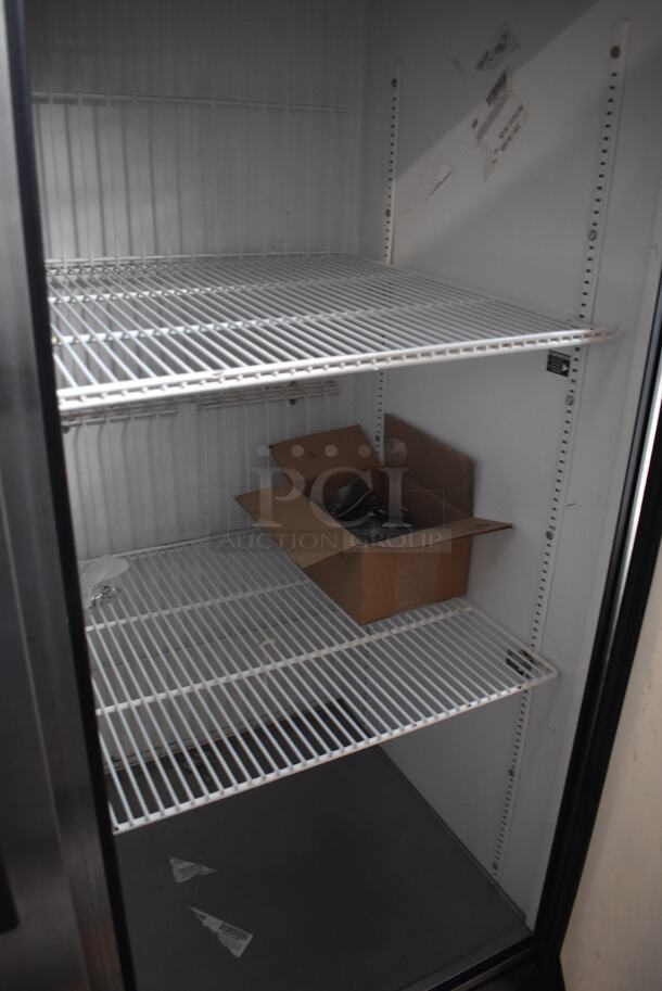 2013 True T-49F ENERGY STAR Stainless Steel Commercial 2 Door Reach In Freezer w/ Poly Coated Racks. Comes w/ Commercial Casters. 115 Volts, 1 Phase. 54x30x78. Tested and Working! - Image 6 of 8