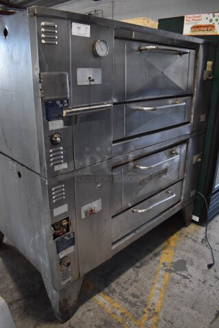 2 Bakers Pride D125 Stainless Steel Commercial Natural Gas Powered Single Deck Pizza Oven w/ Cooking Stones on Metal Legs. 125,000 BTU. 65.5x43x70. 2 Times Your Bid!