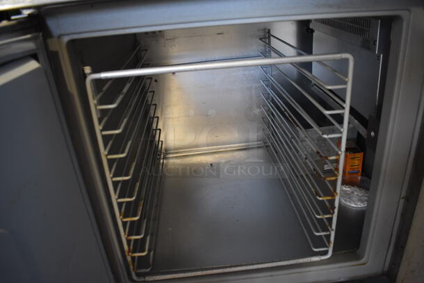 Randell 8148NM Stainless Steel Commercial Pizza Prep Table w/ 2 Over Shelves on Commercial Casters. 115 Volts, 1 Phase. 48x34x72. Tested and Powers On But Does Not Get Cold - Image 6 of 7