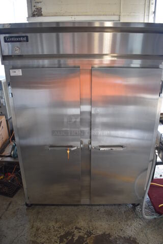 Continental 2FE Stainless Steel Commercial 2 Door Reach In Freezer on Commercial Casters. 115 Volts, 1 Phase. 54x36x82. Tested and Working!