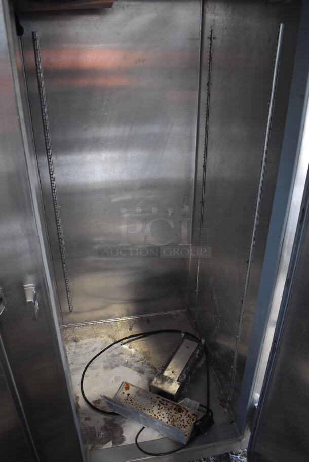 Continental 2FE Stainless Steel Commercial 2 Door Reach In Freezer on Commercial Casters. 115 Volts, 1 Phase. 54x36x82. Tested and Working! - Image 6 of 7