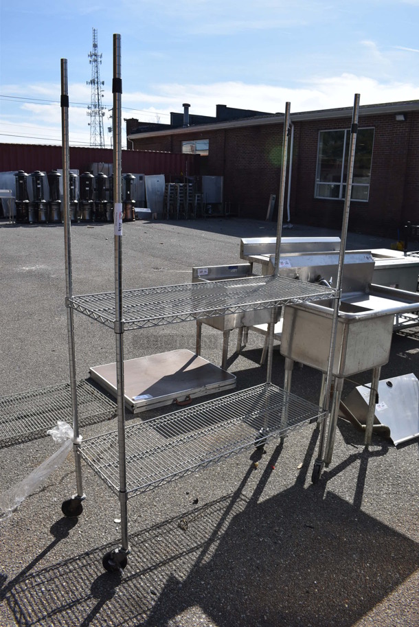 Chrome Finish 2 Tier Wire Shelving Unit on Commercial Casters. BUYER MUST DISMANTLE. PCI CANNOT DISMANTLE FOR SHIPPING. PLEASE CONSIDER FREIGHT CHARGES. 48x18x77 - Image 1 of 3