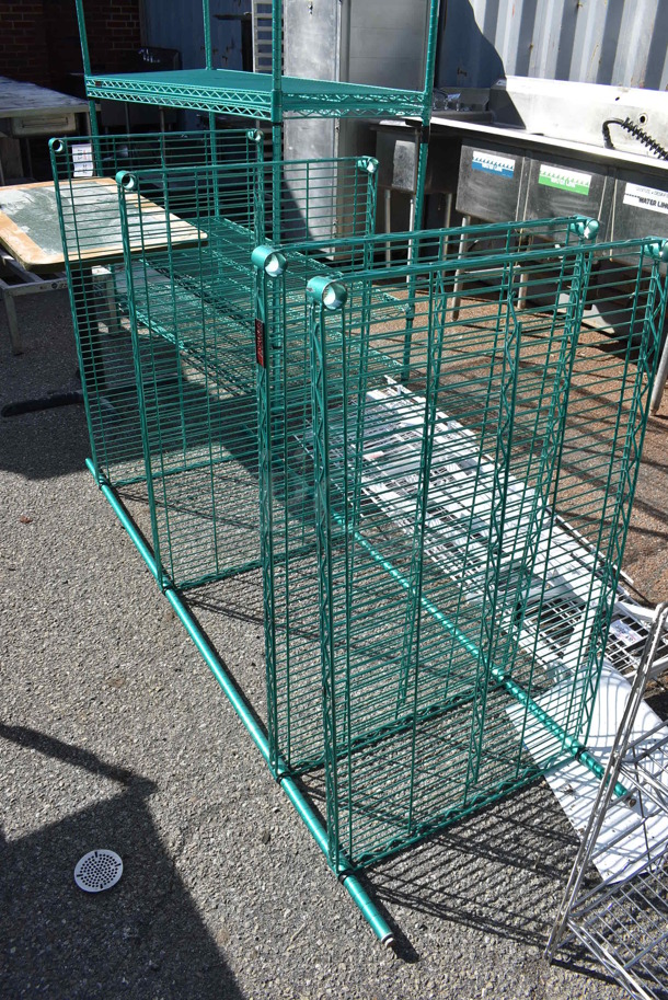 Green Finish 4 Tier Wire Shelving Unit. Missing 2 Poles. BUYER MUST DISMANTLE. PCI CANNOT DISMANTLE FOR SHIPPING. PLEASE CONSIDER FREIGHT CHARGES. 42x24x74 - Image 1 of 3