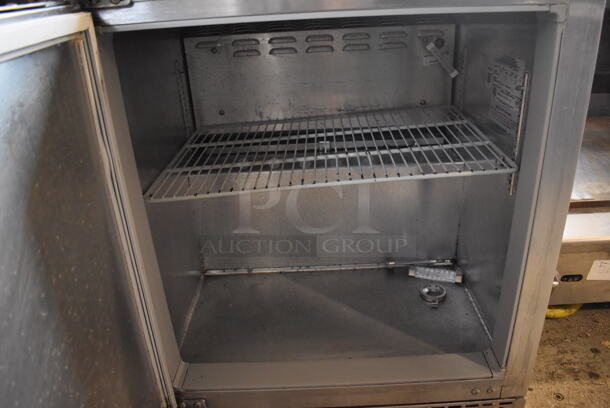 Continental UC27 Stainless Steel Commercial Single Door Undercounter Cooler on Commercial Casters. 115 Volts, 1 Phase. 28x30.5x32. Tested and Powers On But Does Not Get Cold - Image 3 of 5