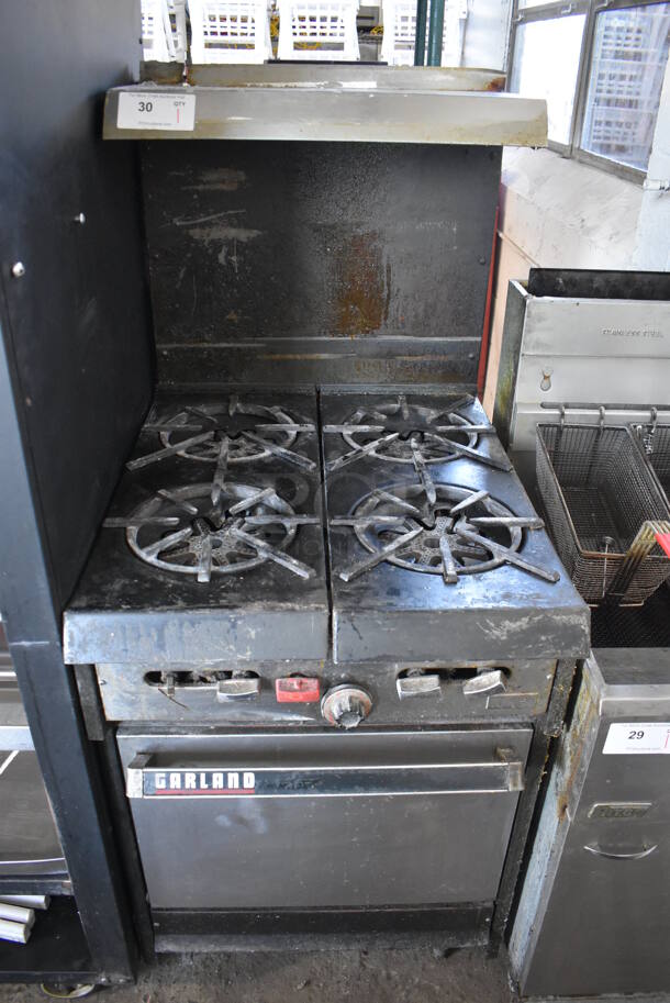 Garland Metal Commercial Natural Gas Powered 4 Burner Range w/ Oven, Over Shelf and Back Splash. 24x32x59.5 - Image 1 of 8