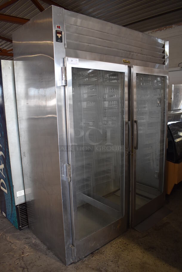 Traulsen ARI232HUT-FHG Stainless Steel Commercial 2 Door Roll In Rack Cooler Merchandiser. 115 Volts, 1 Phase. 68x34x89. Tested and Powers On But Does Not Get Cold