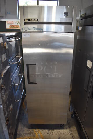 True TG1F-1S Stainless Steel Commercial Single Door Reach In Freezer w/ Poly Coated Racks on Commercial Casters. 115 Volts, 1 Phase. 29x35x83. Tested and Working!