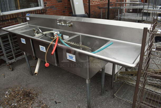 Stainless Steel Commercial 3 Bay Sink w/ Dual Drain Boards, Faucet, Handles and Spray Nozzle Attachment. 93.5x24x43. Bays 18x18x12. Drain Boards 16x20x2 - Image 1 of 6