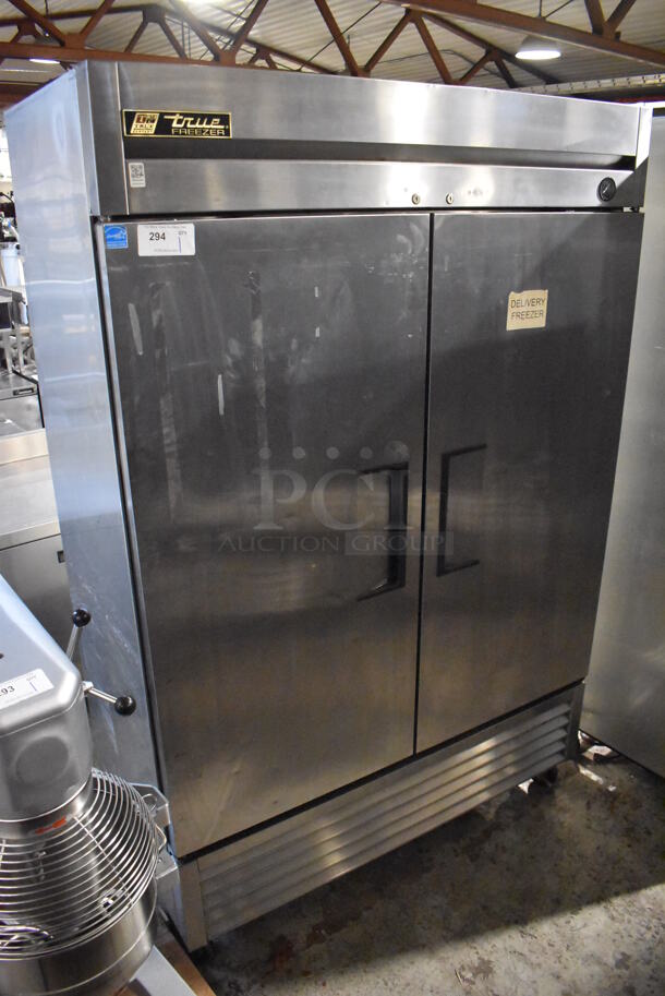 2013 True T-49F ENERGY STAR Stainless Steel Commercial 2 Door Reach In Freezer w/ Poly Coated Racks on Commercial Casters. 115 Volts, 1 Phase. 54x30x83. Tested and Working!