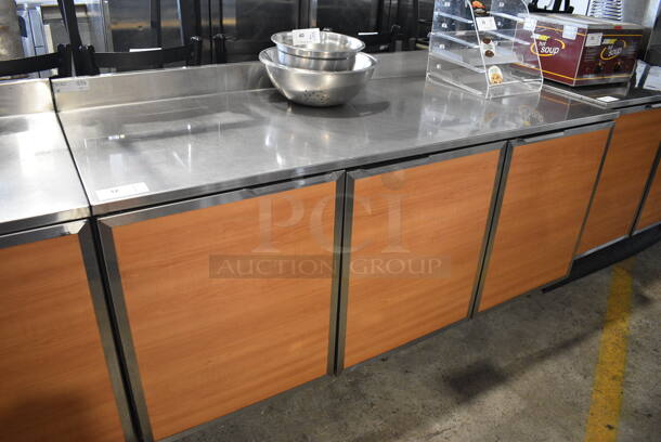 Duke SUBP-72M Stainless Steel Counter w/ 3 Wood Pattern Doors. 72x30x40